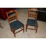 A pair of 19th century mahogany dining chairs with spindle turned splats,
