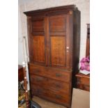 An early 19th century oak two tier house keepers cupboard,