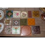 A quantity of Victorian and later polychrome glazed tiles,