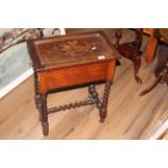 An inlaid mahogany and oak sewing table,