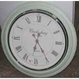 A Tewkesbury Cotswolds pale green metal quartz kitchen clock, with white dial,