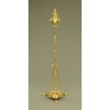 A 19th century brass lamp standard,