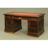 An oak pedestal desk,