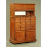 An Edwardian walnut dental cabinet,