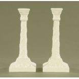 A pair of royal Worcester porcelain candlesticks, in the Adam style,