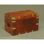 A 19th century camphor wood trunk, brass bound with iron carrying handle to either side.