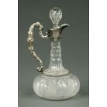 An Edwardian cut glass claret jug,