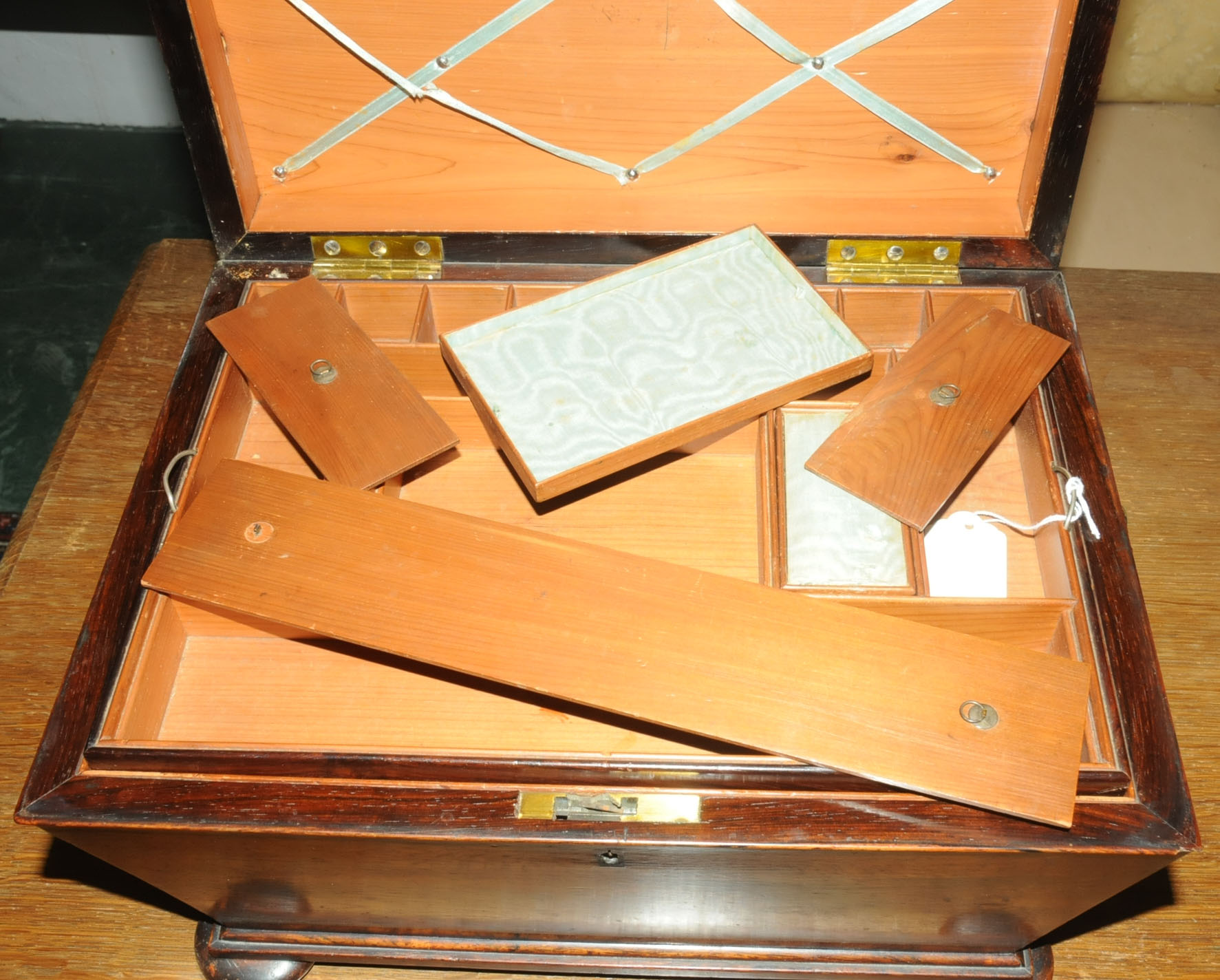 A Regency rosewood table box, with bronze handles, sarcophagus form with interior fitted for sewing. - Image 9 of 10