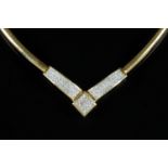 An 18 ct gold diamond set necklace, stamped "18 k", 24 grams gross.