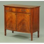 A mahogany bowfronted sideboard,