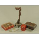Three pieces of antique bronze money, a Chinese dragon lamp, lacquered tea caddy and two boxes.