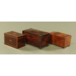 Three 19th century mahogany tea caddies, two of sarcophagus form and one with inlaid shell.
