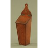 An early 19th century oak and mahogany crossbanded boxwood and ebony strung candle box, dated 1829.