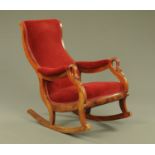 A Victorian mahogany rocking chair,