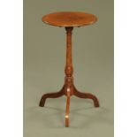 A George III mahogany circular wine table,