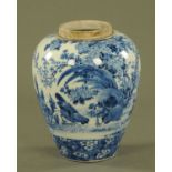 A 19th century Japanese blue and white vase, decorated with a cockerel. Height 23 cm.