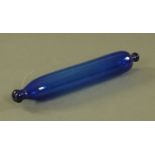 A 19th century Bristol blue glass rolling pin. Length 34 cm.