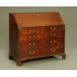 A George III mahogany bureau,