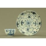 An 18th century Chinese blue and white tea bowl, and a Tek Sing Treasure small plate,