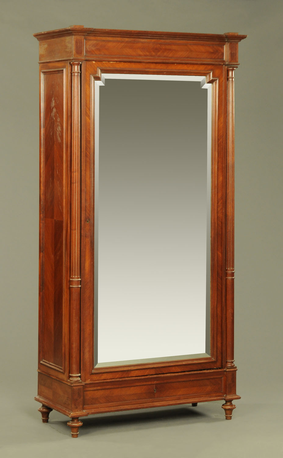 A Continental oak and mahogany wardrobe,