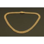A 9 ct gold necklace, 21.8 grams. Length 46 cm (see illustration).