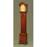 A mahogany grandmother clock, with three train striking movement and painted dial,
