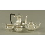 A late Victorian four piece silver half lobed tea service,