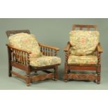 A pair of reclining armchairs, circa 1930, with adjustable backs,