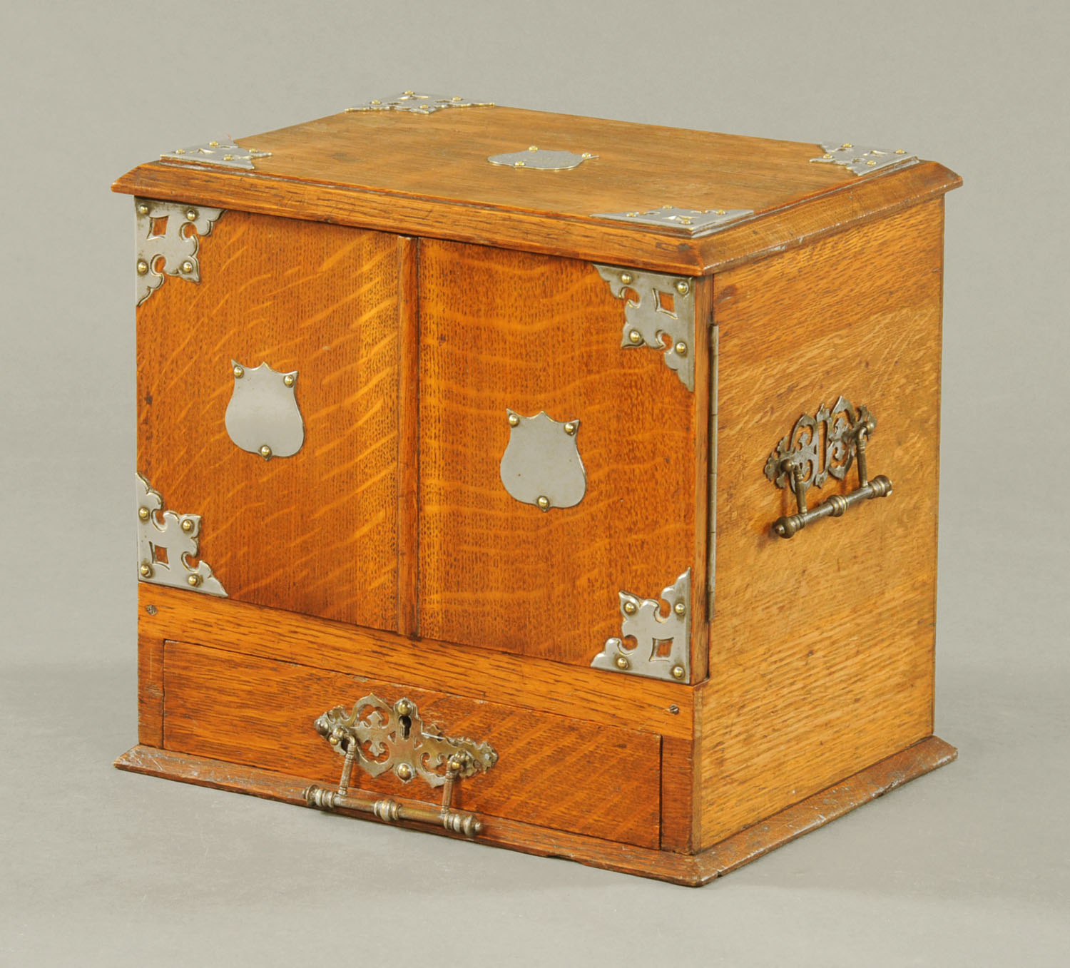 An Edwardian oak table casket, of rectangular form with plated mounts and registration No.