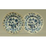 A pair of Meissen onion pattern dishes, diameter 15 cm.