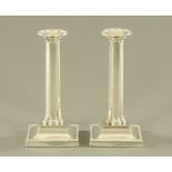 A pair of silver candlesticks by Martin Hall & Co (Richard Martin and Ebenezer Hall recorded