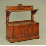 A Victorian oak dumbwaiter, with rear upstand, open shelf,