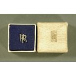 A vintage Rolls Royce chauffeurs badge, in original box. 15 mm x 9 mm.