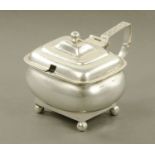 A George III silver lidded mustard pot with domed cover and loop basket work handle,
