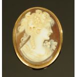 A 9 ct gold mounted cameo brooch, female figure. 38 mm x 30.6 mm, gross weight 7.7 grams.