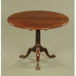 A George III mahogany tripod table, with well figured circular top,