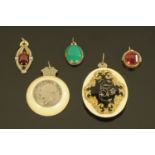 Five Victorian pendants, four ivory mounted and set with various coins, semiprecious stones etc.