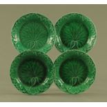 Four Victorian Wedgwood cabbage leaf plates, impressed mark. Diameter 20 cm.