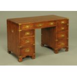 A mahogany military style desk,