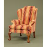 A Queen Anne style wing easy chair,