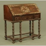 An 18th century oak burr elm and walnut bone inlaid bureau, with slope front to fitted interior,