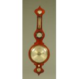A 19th century mahogany veneered banjo barometer, by Scott & Son of Kendal. Height 105 cm.