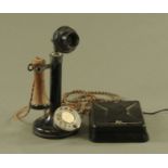 A 1920's stick telephone.