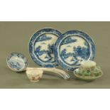 Two 19th century blue and white patterned plates, a soup ladle transfer printed with cattle,