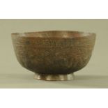 An antique Persian bronze bowl, diameter 20 cm.