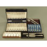 A cased bread knife and pie server with silver handles, together with a set of quill menu holders,