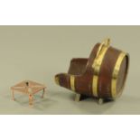 An oak brass bound barrel form coal or log receiver, and a copper trivet.