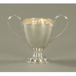 A George III silver two handled vessel, with glass liner, London mark 1816 makers mark rubbed.