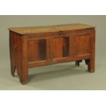 An antique oak coffer,