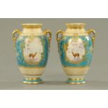 A pair of Noritake vases, decorated with panels of eastern scenes,